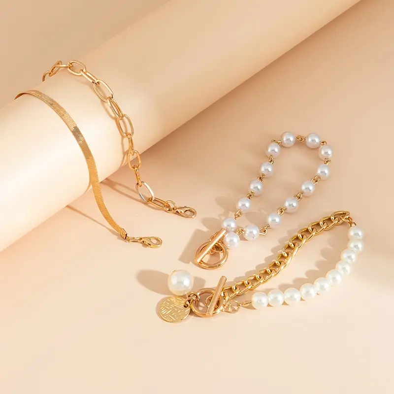 Chic Gold 4-Piece Bracelet Set – Snake, Pearls & Links | Gold - Image 5