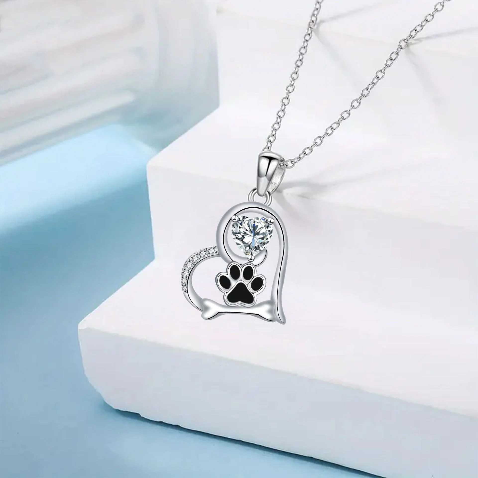 Handcrafted Dog Paw Print and Bone Necklace with Zirconia - Image 3