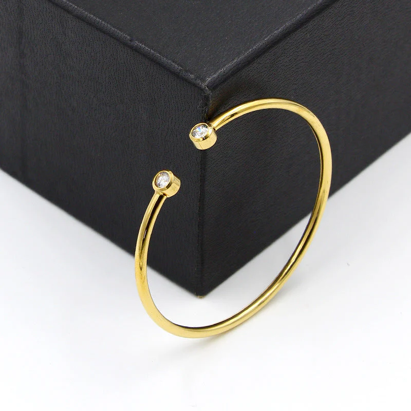 Open Gold Bracelet with Twin Crystals