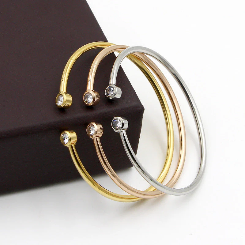 Open Gold Bracelet with Twin Crystals - Image 2