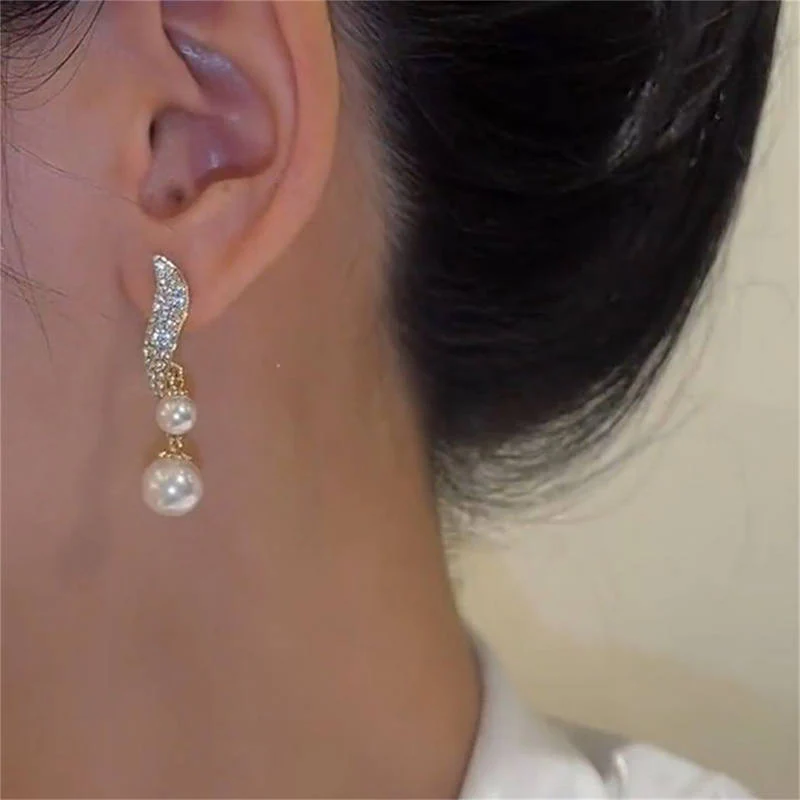 Pearl Earrings in Gold - Image 2